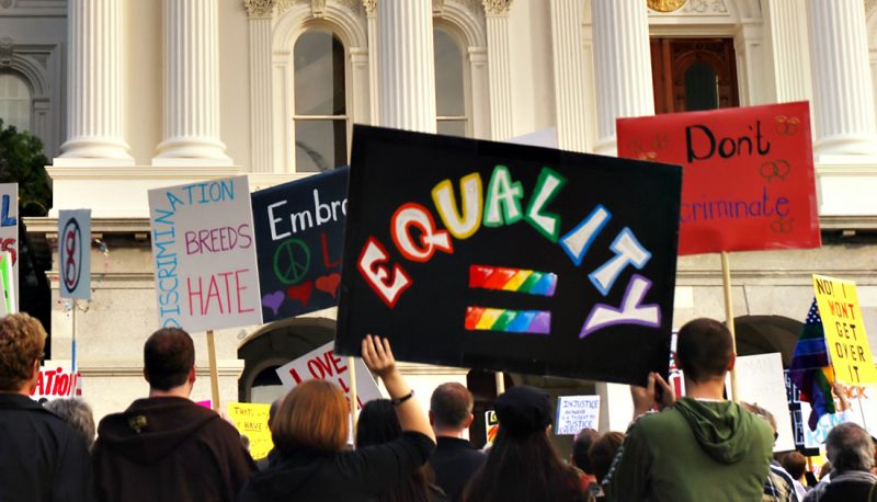 Discrimination Drives LGBTQ+ People into Poverty and the Criminal Legal System