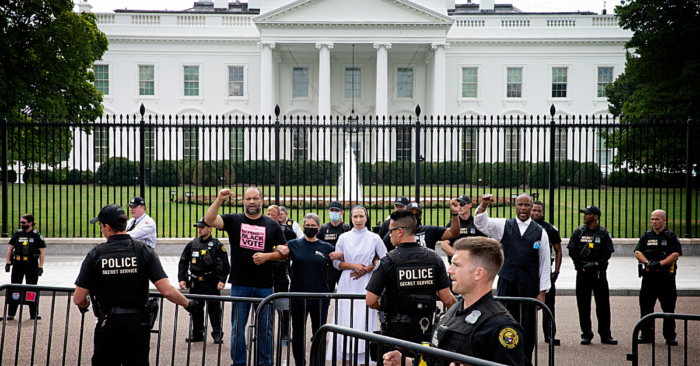People For President Ben Jealous and four other civil rights and faith leaders are arrested for protesting peacefully at the White House on October 5, 2021.