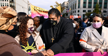 Reverend William Barber II leads the crowd of approximately 800 activists protesting for voting rights as they walk down Black Lives Matter Plaza towards the White House on November 17, 2021.